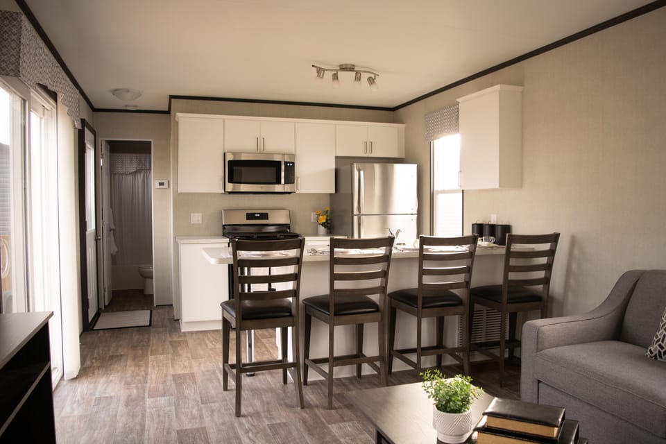 Deluxe Cottage | Private kitchen | Full-size fridge, microwave, oven, stovetop
