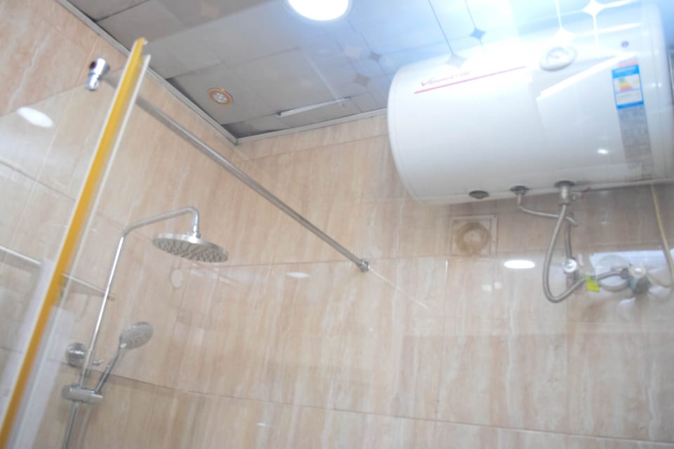 Rainfall showerhead, hair dryer, slippers, towels