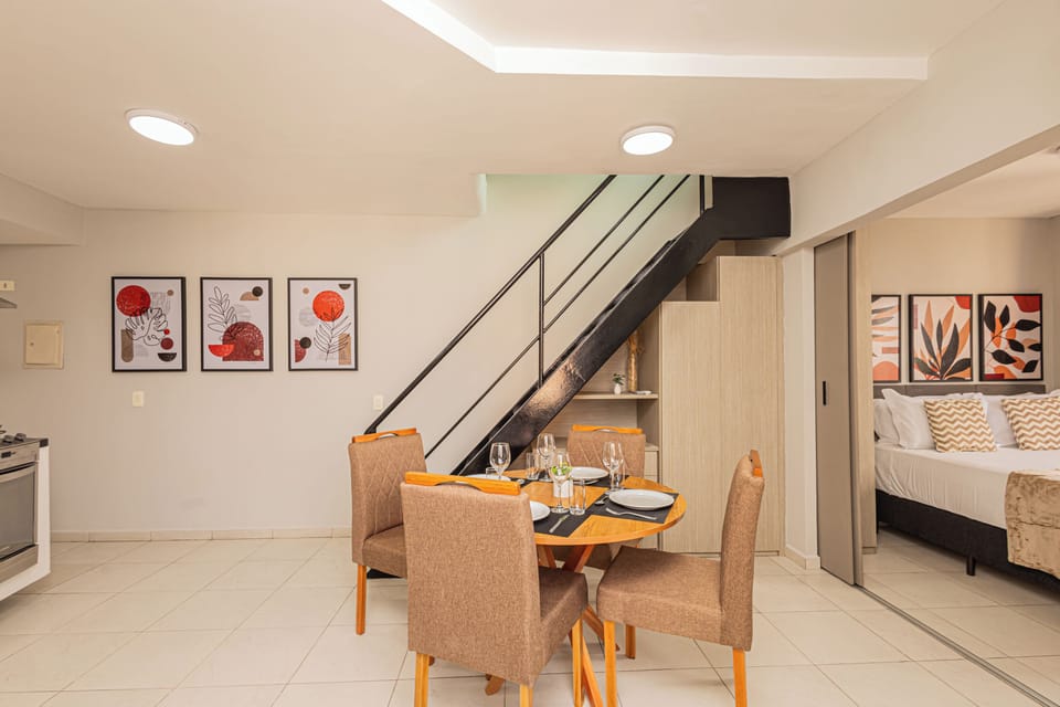 Elite Studio Suite | Living area | 32-inch flat-screen TV with cable channels, TV
