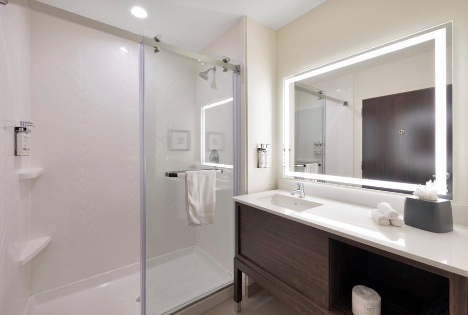 Hair dryer, towels, soap, shampoo
