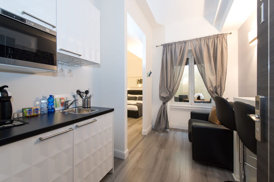 Junior Studio Suite, Patio | In-room safe, desk, blackout drapes, soundproofing
