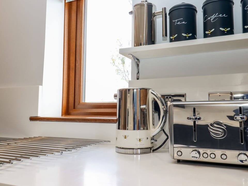 Fridge, dishwasher, electric kettle, cookware/dishes/utensils