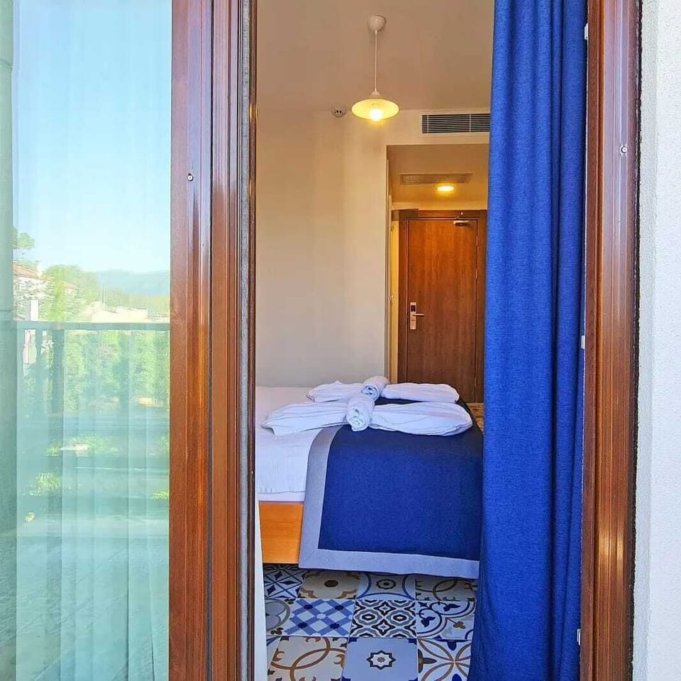 Double Room | Free minibar items, individually decorated, individually furnished, desk