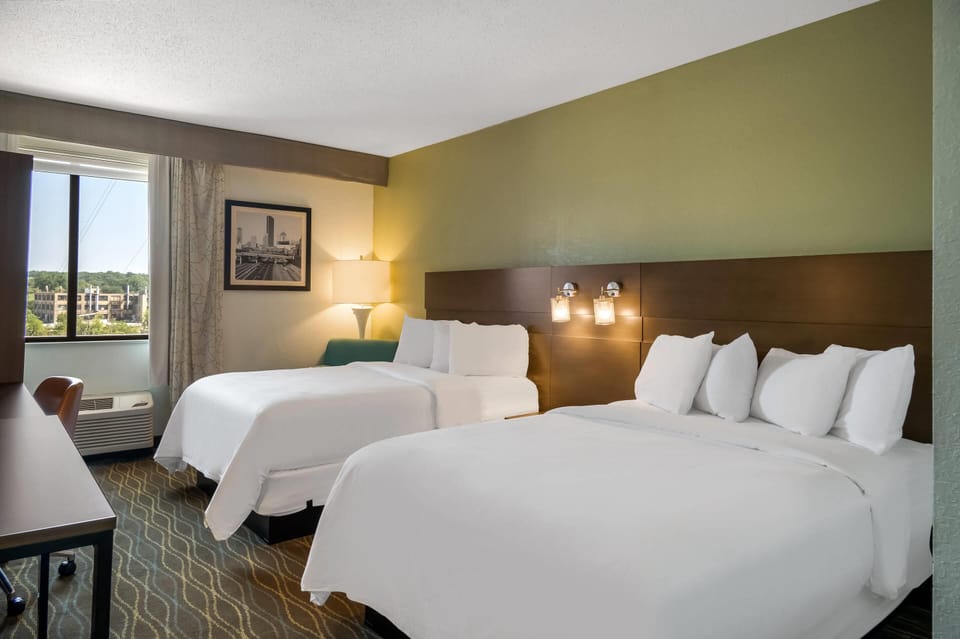 Premium bedding, down comforters, desk, blackout drapes