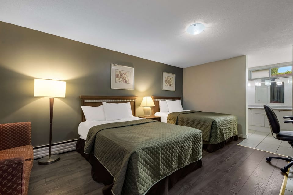 Room, 2 Double Beds | Desk, free WiFi, bed sheets, alarm clocks