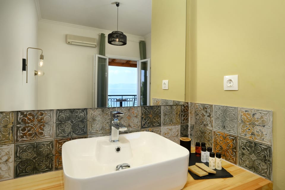 Deluxe Double Room, Balcony, Sea View | Memory foam beds, desk, soundproofing, iron/ironing board