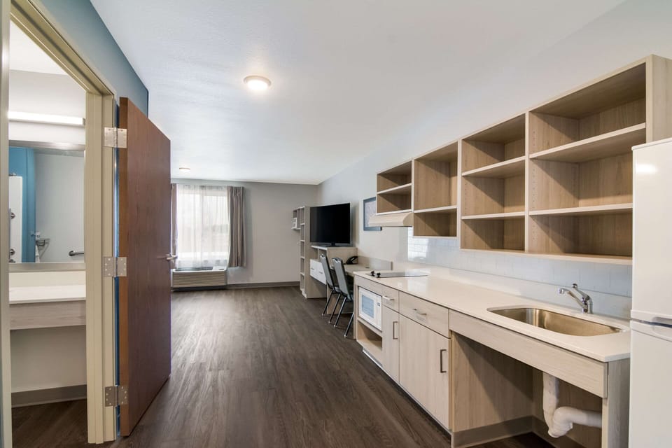 Individually furnished, desk, laptop workspace, blackout drapes