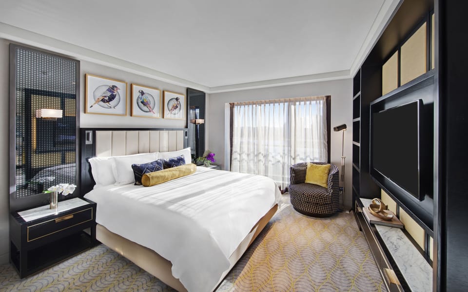 Premium bedding, down comforters, Tempur-Pedic beds, in-room safe