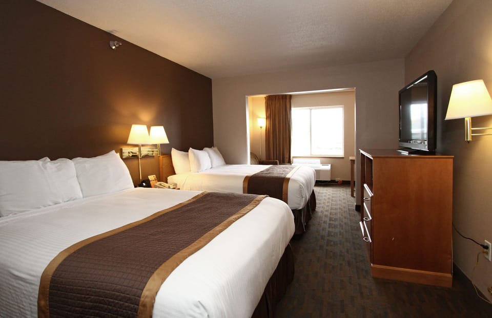 Superior Room, Multiple Beds | Desk, laptop workspace, blackout drapes, iron/ironing board
