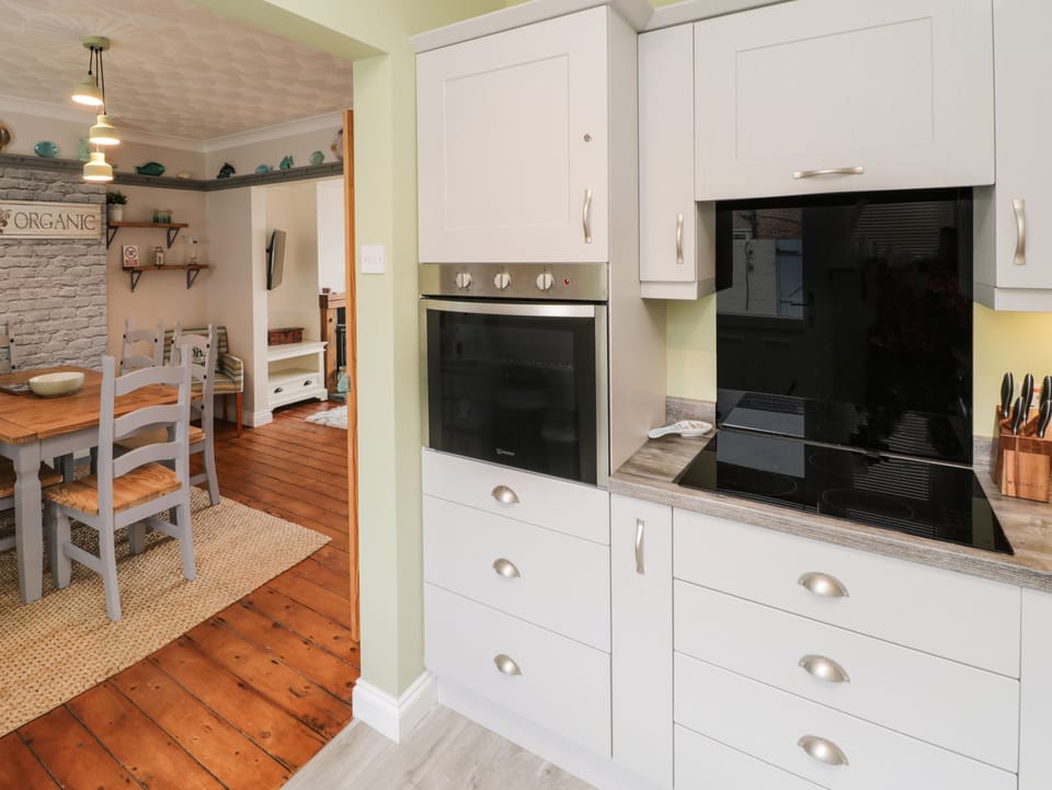 Fridge, electric kettle, toaster, cookware/dishes/utensils