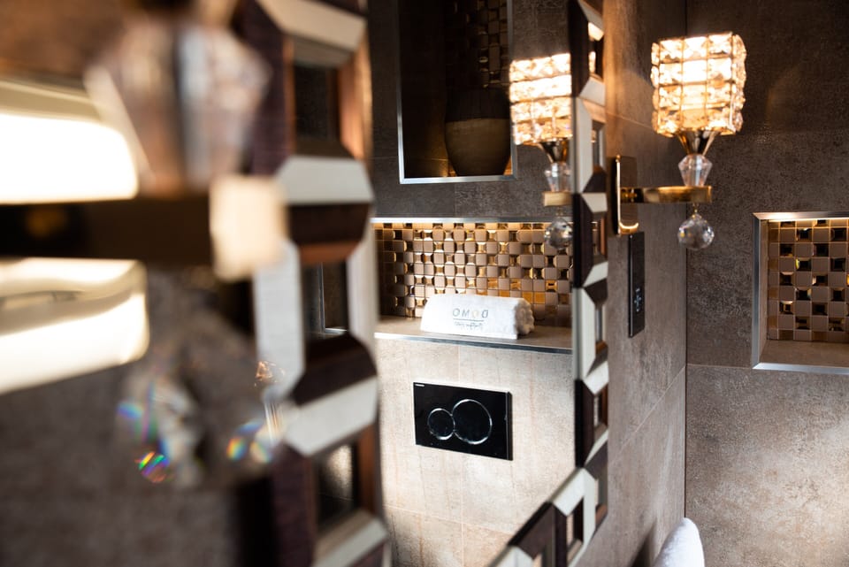 Venetian Suite | Bathroom | Shower, rainfall showerhead, designer toiletries, hair dryer