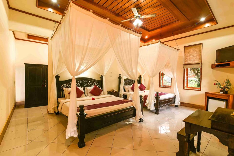 Family Suite with Garden View | Egyptian cotton sheets, minibar, in-room safe, desk