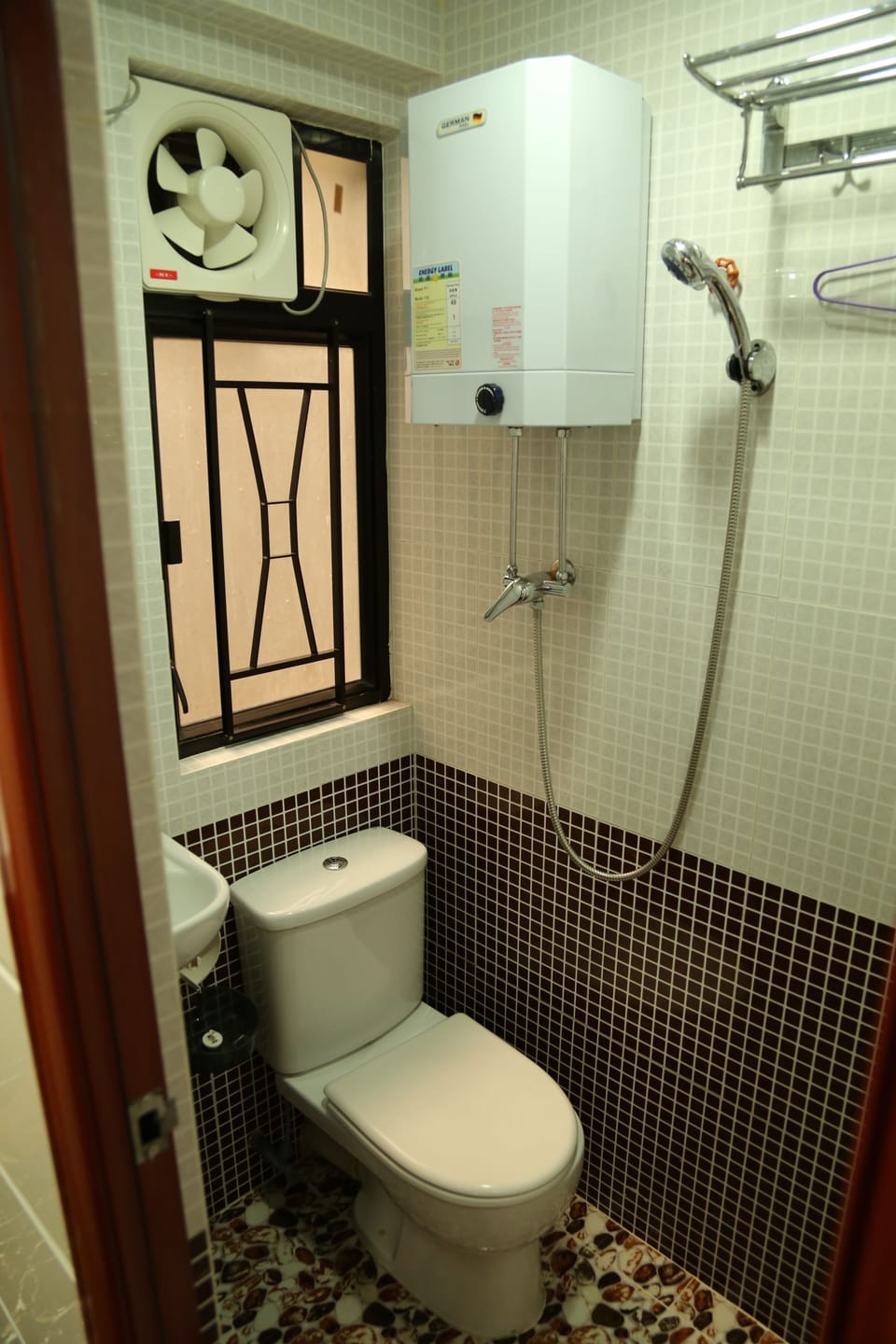 Shower, hair dryer, slippers, towels
