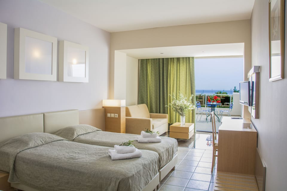 Twin Room with Garden View | In-room safe, free WiFi, bed sheets