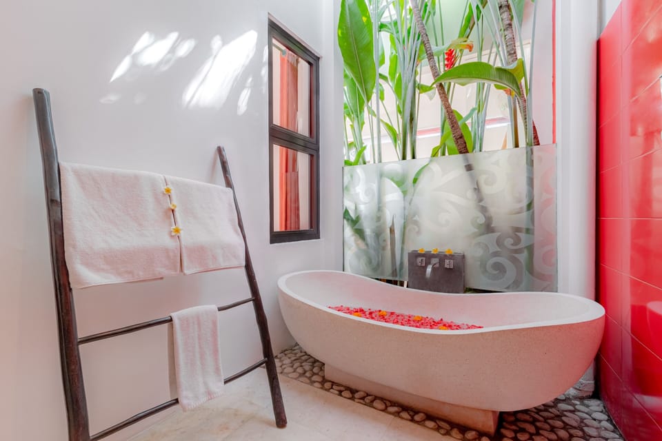 Ginger Suite Poolside 3 | Bathroom | Eco-friendly toiletries, hair dryer, bathrobes, slippers