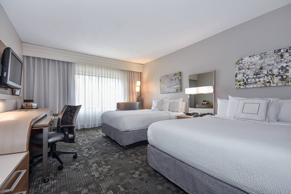 Premium bedding, down comforters, in-room safe, desk