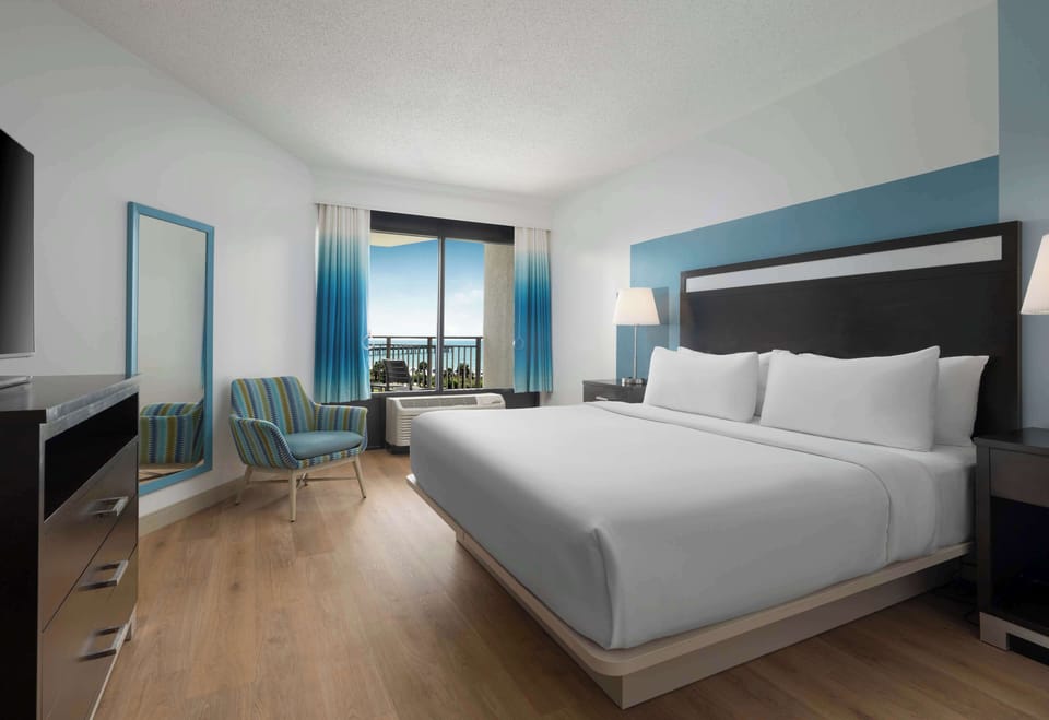 Premium bedding, down comforters, pillowtop beds, in-room safe