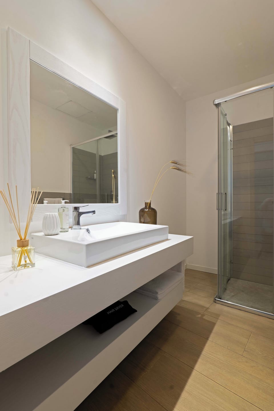 Shower, hair dryer, bathrobes, towels