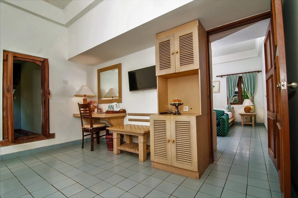 Deluxe Room, Pool Access | Desk, laptop workspace, iron/ironing board, free WiFi