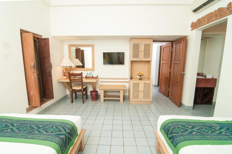 Deluxe Room, Pool Access | Desk, laptop workspace, iron/ironing board, free WiFi