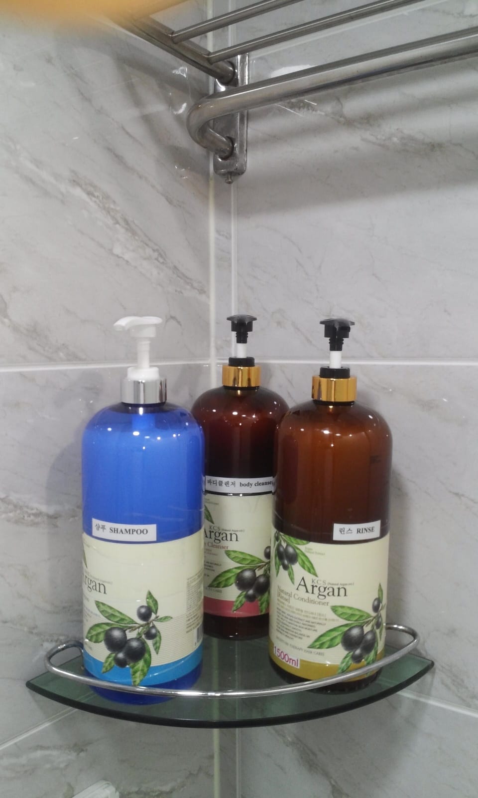 Shower, hair dryer, slippers, towels