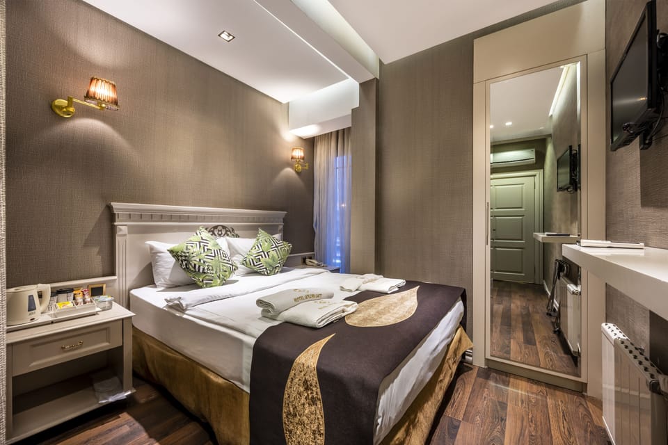 Economy Room | Egyptian cotton sheets, premium bedding, Select Comfort beds