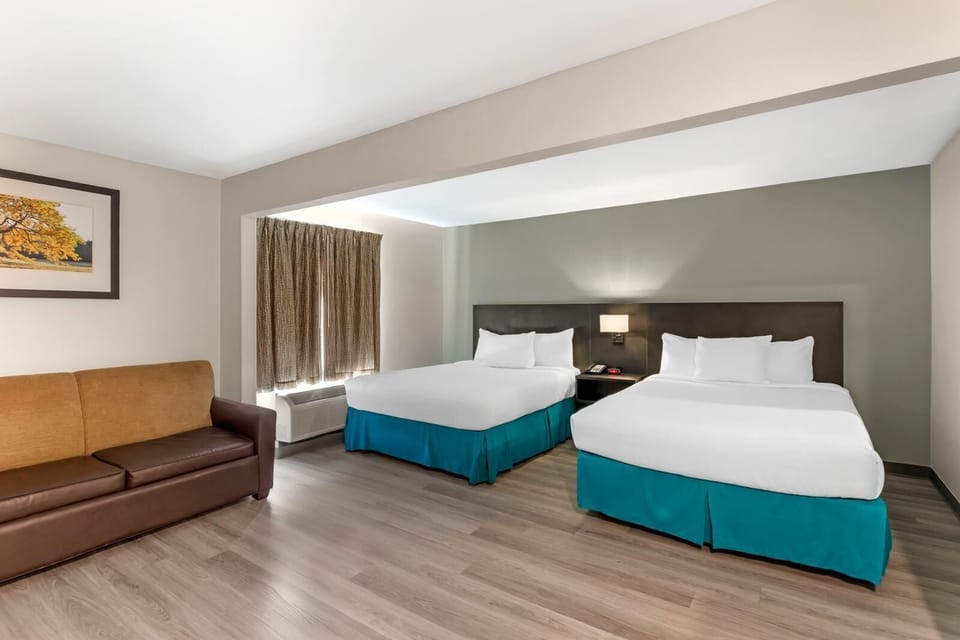Suite, 2 Queen Beds, Non Smoking (Efficiency) | Desk, blackout drapes, iron/ironing board, free WiFi