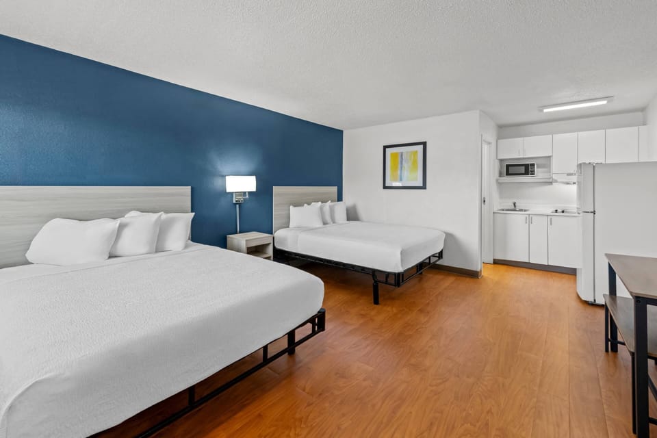 Economy Studio, 2 Queen Beds, Non Smoking | Desk, bed sheets