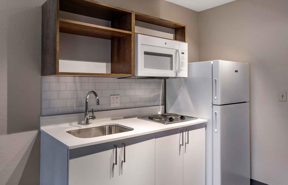 Studio, 1 King Bed, Non Smoking | Private kitchen | Full-size fridge, microwave, stovetop, coffee/tea maker