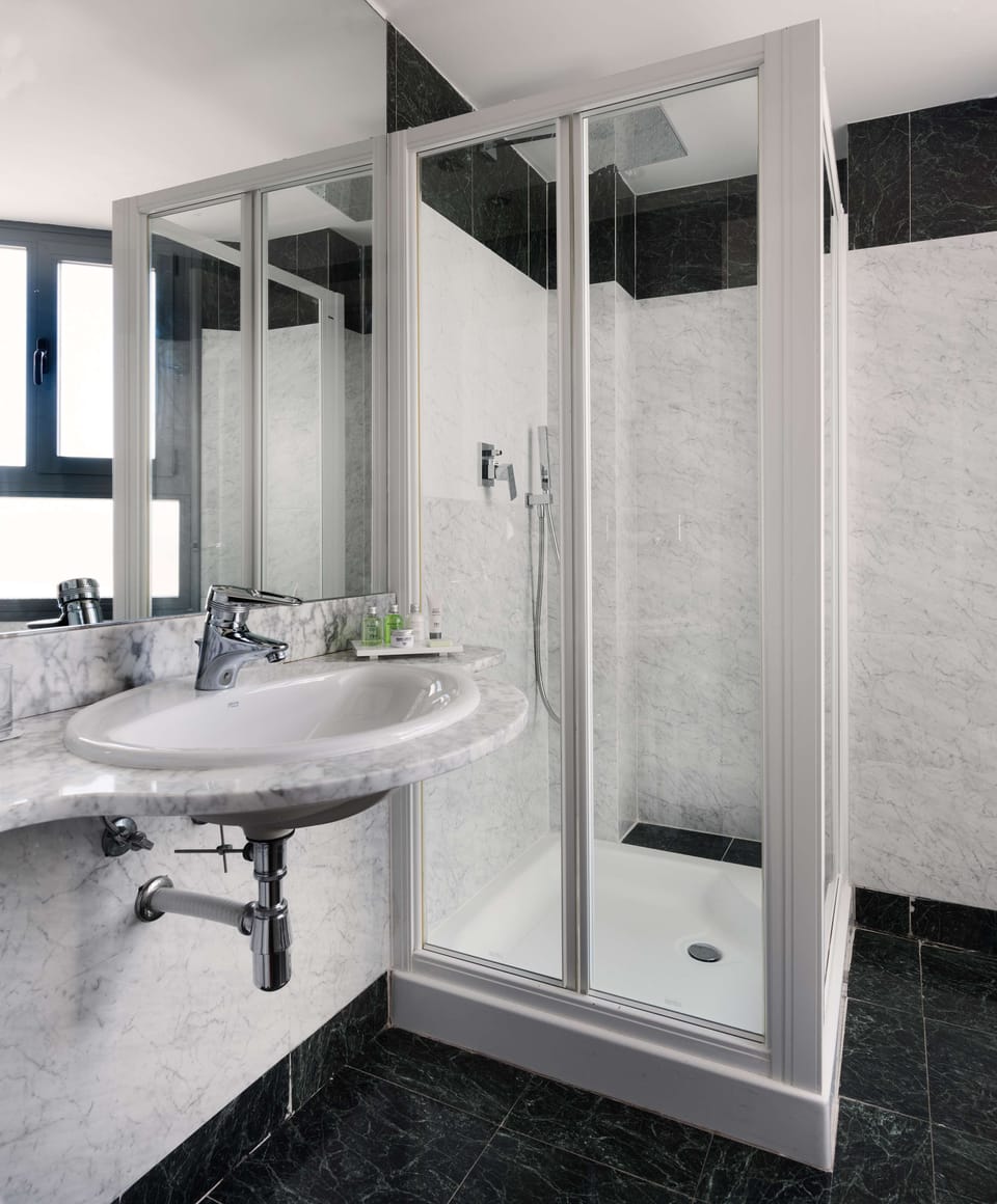 Superior Room | Bathroom | Bathtub, deep soaking tub, eco-friendly toiletries, hair dryer