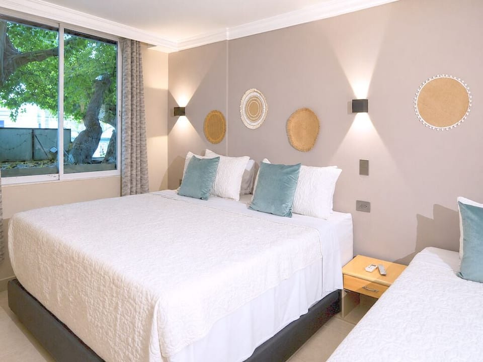 Standard Triple Room | Hypo-allergenic bedding available, in-room safe, desk, WiFi (free)