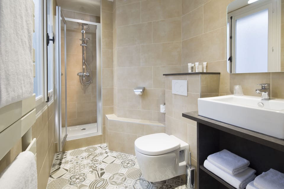 Eco-friendly toiletries, hair dryer, bathrobes, towels