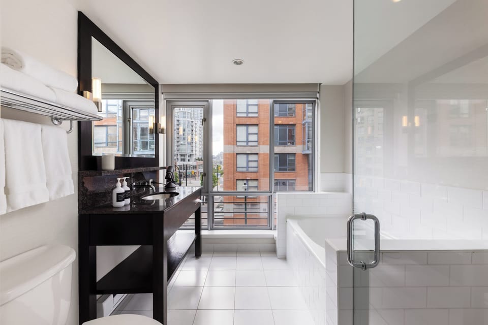 Executive Two Bedroom Suite | Bathroom | Designer toiletries, hair dryer, bathrobes, slippers