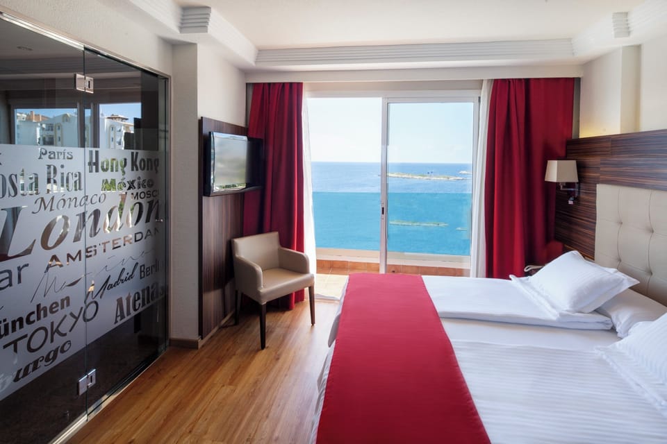 Junior Suite, Sea View | In-room safe, desk, blackout drapes, free WiFi