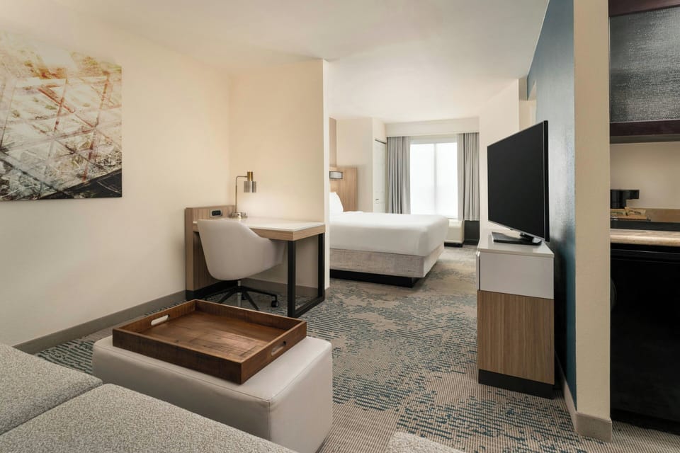 Premium bedding, down comforters, pillowtop beds, in-room safe
