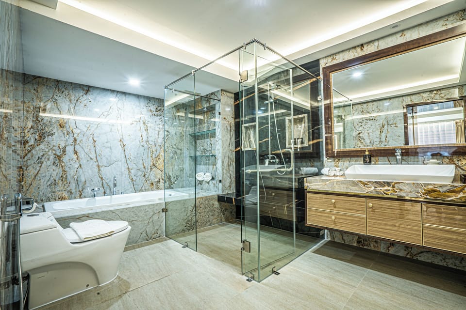 Presidential Suite, City View | Bathroom | Shower, rainfall showerhead, free toiletries, bathrobes