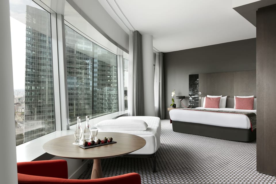 Premium bedding, desk, blackout drapes, soundproofing