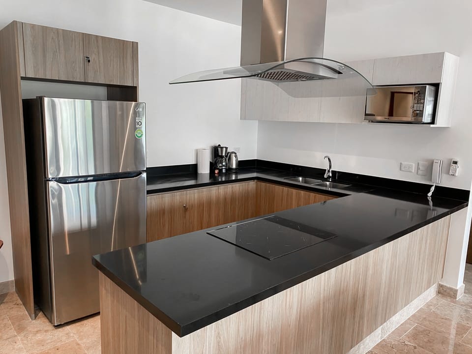 Exclusive Apartment | Private kitchen | Full-size fridge, microwave, oven, coffee/tea maker