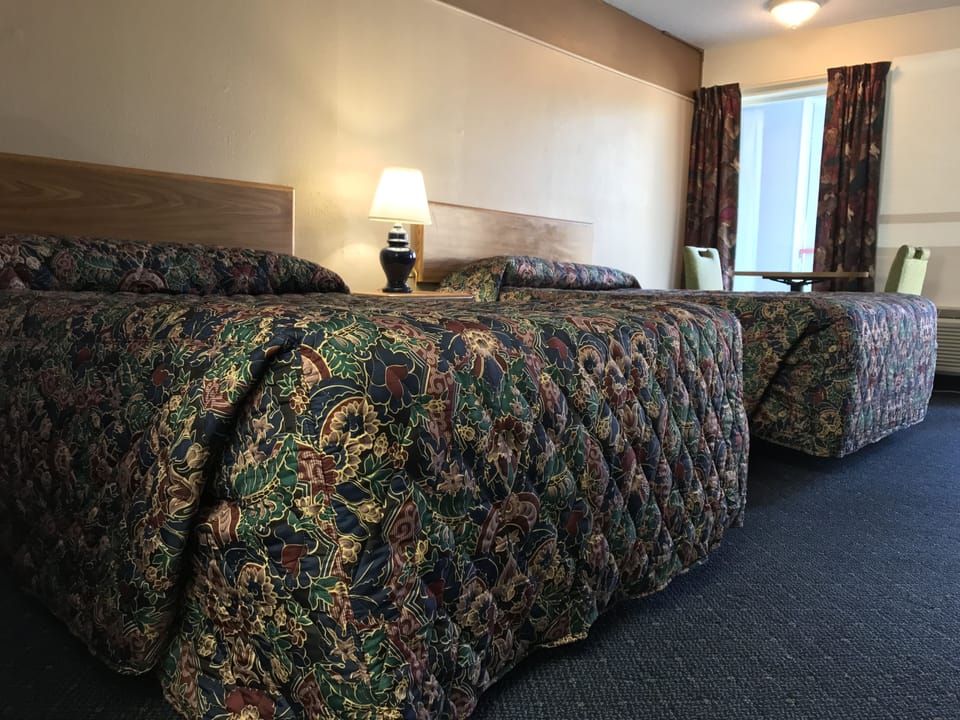 Desk, blackout drapes, iron/ironing board (on request), WiFi (free)