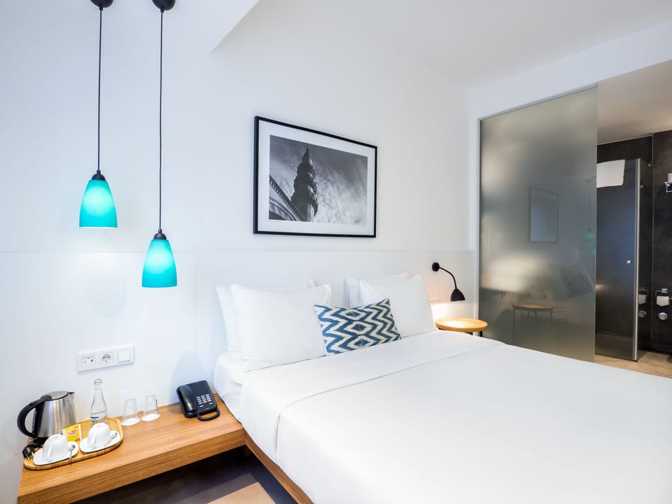 Standard Double Room | Minibar, in-room safe, soundproofing, iron/ironing board