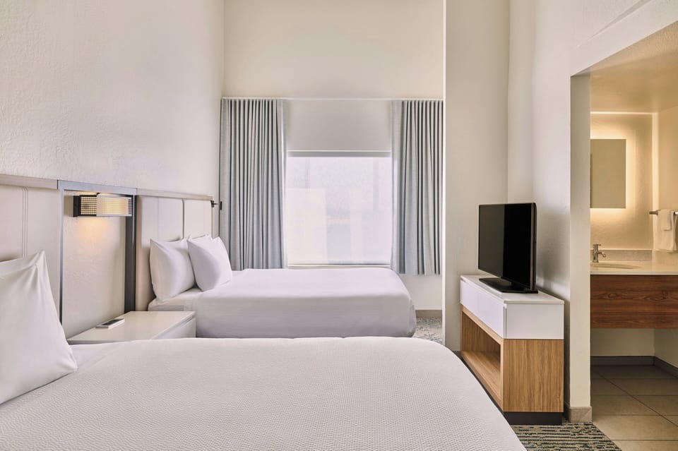 Suite, Multiple Beds | In-room safe, desk, iron/ironing board, free WiFi