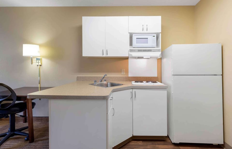 Studio, 1 King Bed, Non Smoking | Private kitchen | Full-size fridge, microwave, stovetop, coffee/tea maker