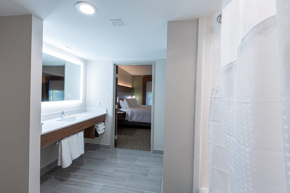 Suite, 1 King Bed | In-room safe, desk, laptop workspace, iron/ironing board