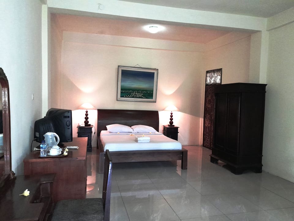 Deluxe Double Room | Pillowtop beds, desk, laptop workspace, blackout drapes