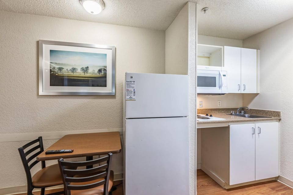 Studio, 2 Double Beds, Non Smoking (Renovated) | Private kitchenette | Fridge, microwave, stovetop, dining tables