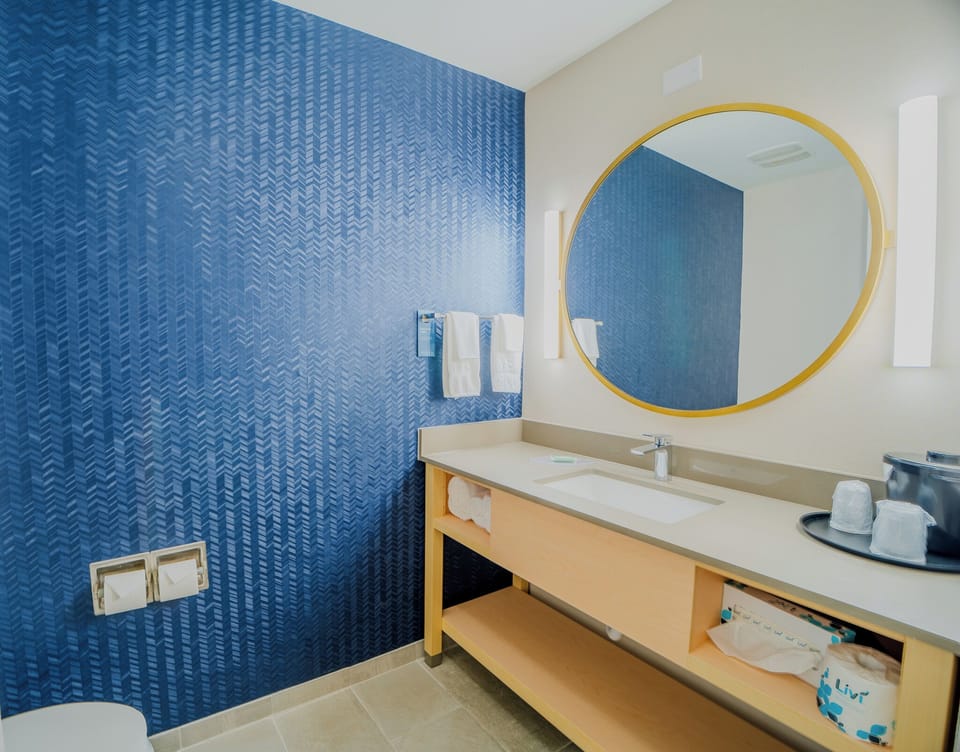 Combined shower/tub, hair dryer, towels, soap
