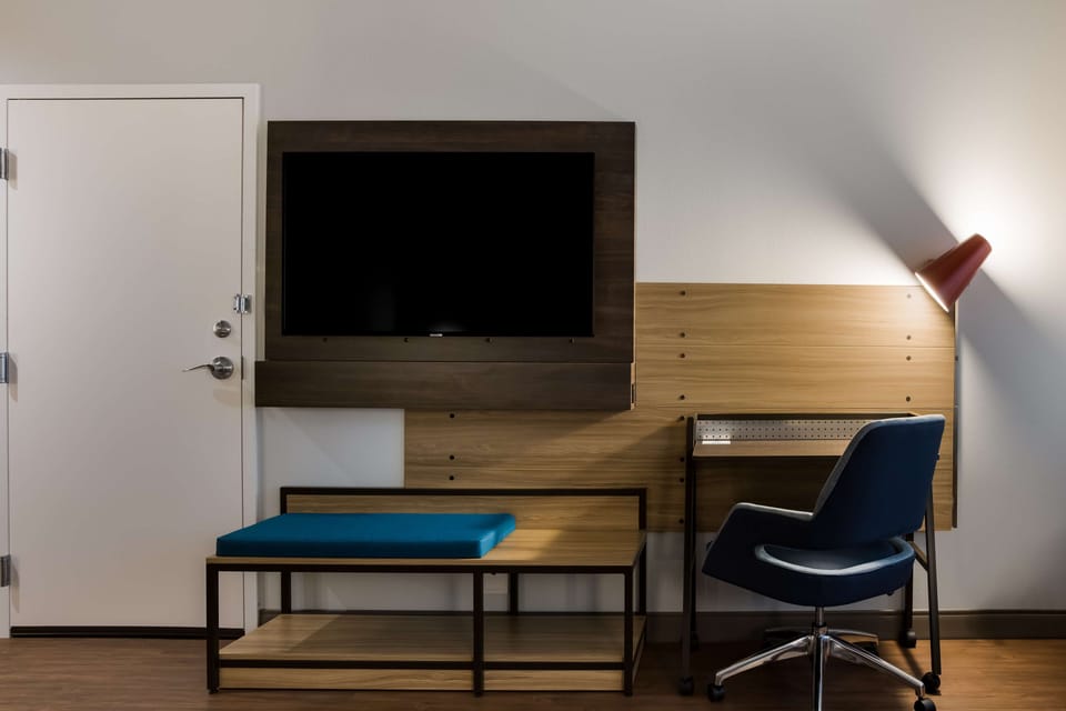 Room, 1 King Bed, Accessible (Roll-In Shower) | Desk, laptop workspace, blackout drapes, iron/ironing board