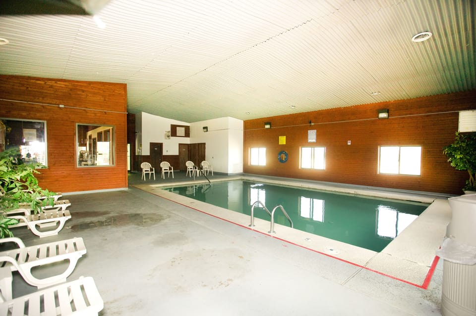Indoor pool, open 10:00 AM to 10:00 PM, sun loungers