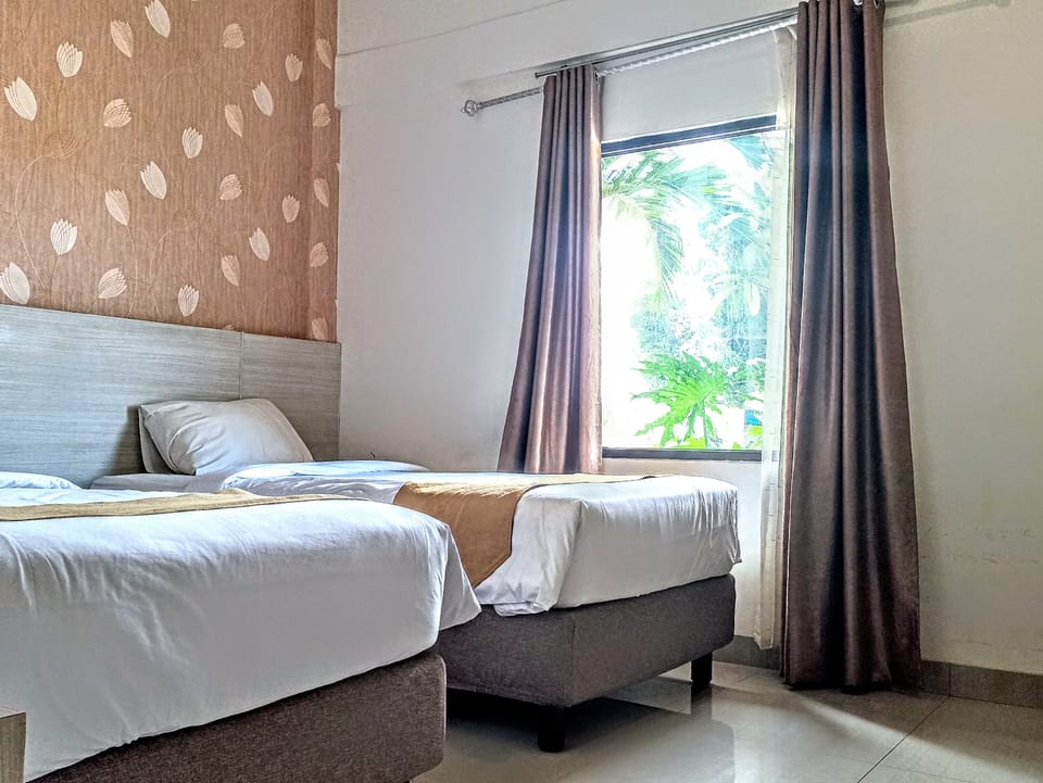 Desk, laptop workspace, blackout drapes, WiFi (free)