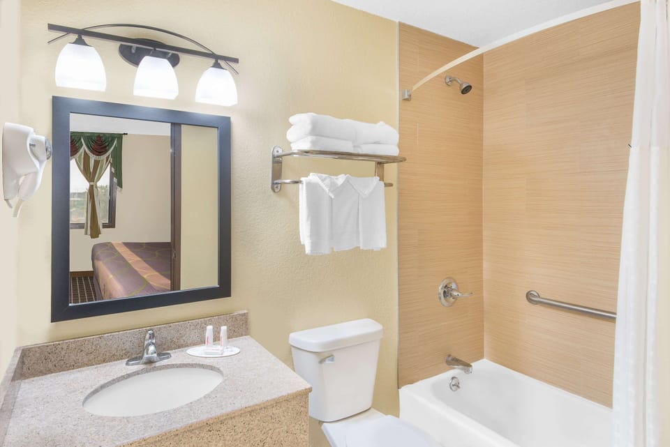 Combined shower/tub, deep soaking tub, free toiletries, hair dryer